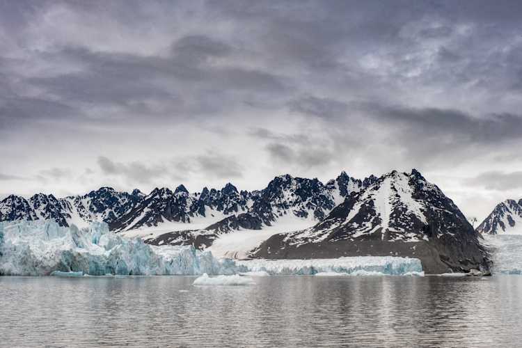 Svalbard mountains and glaciers from the water during summer