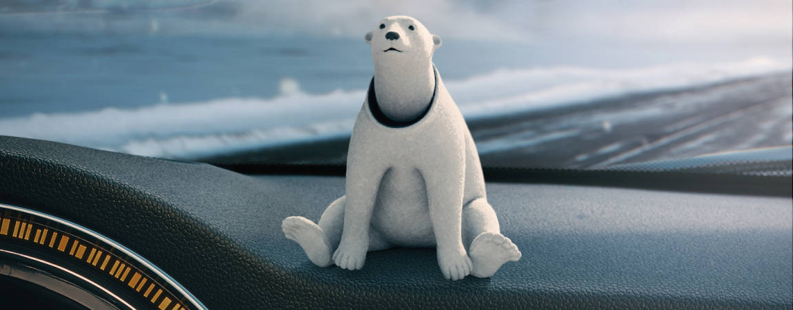 Polar bear bobblehead on a dashboard