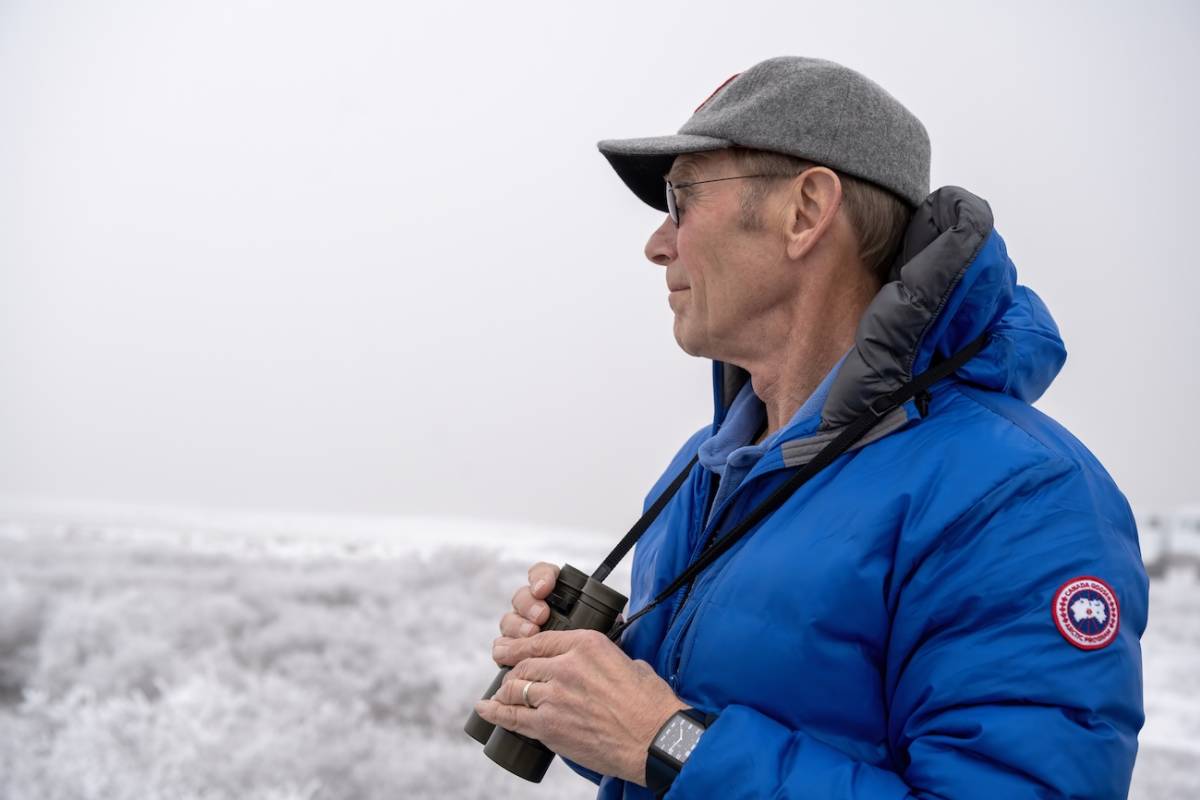 Polar bear biologist Steve Amstrup looks out off the Tundra Buggy