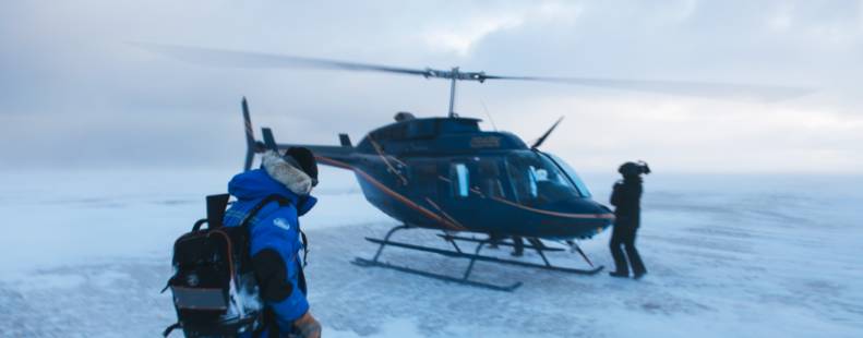 Researchers looking at a helicopter