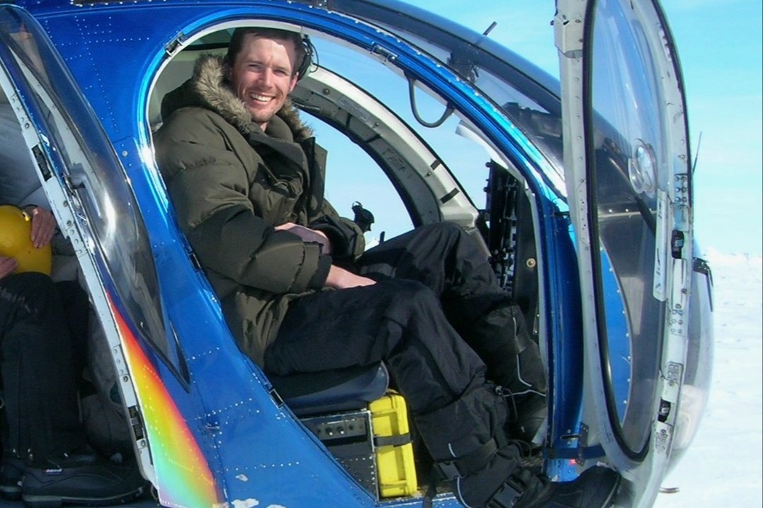 John Whiteman in a helicopter
