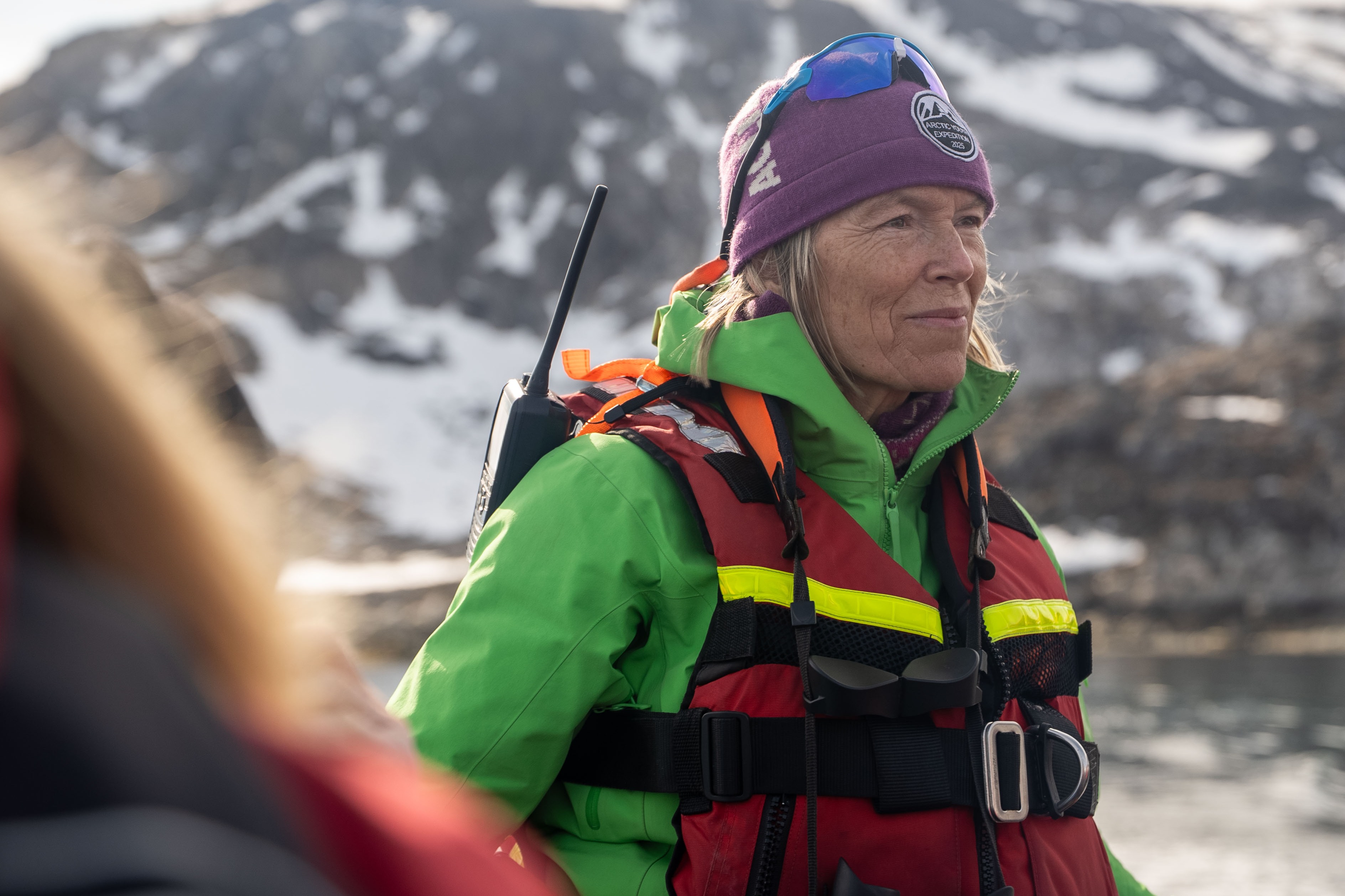 Hilde Falun Strom guides a tour group on a zodiac boat in Svalbard
