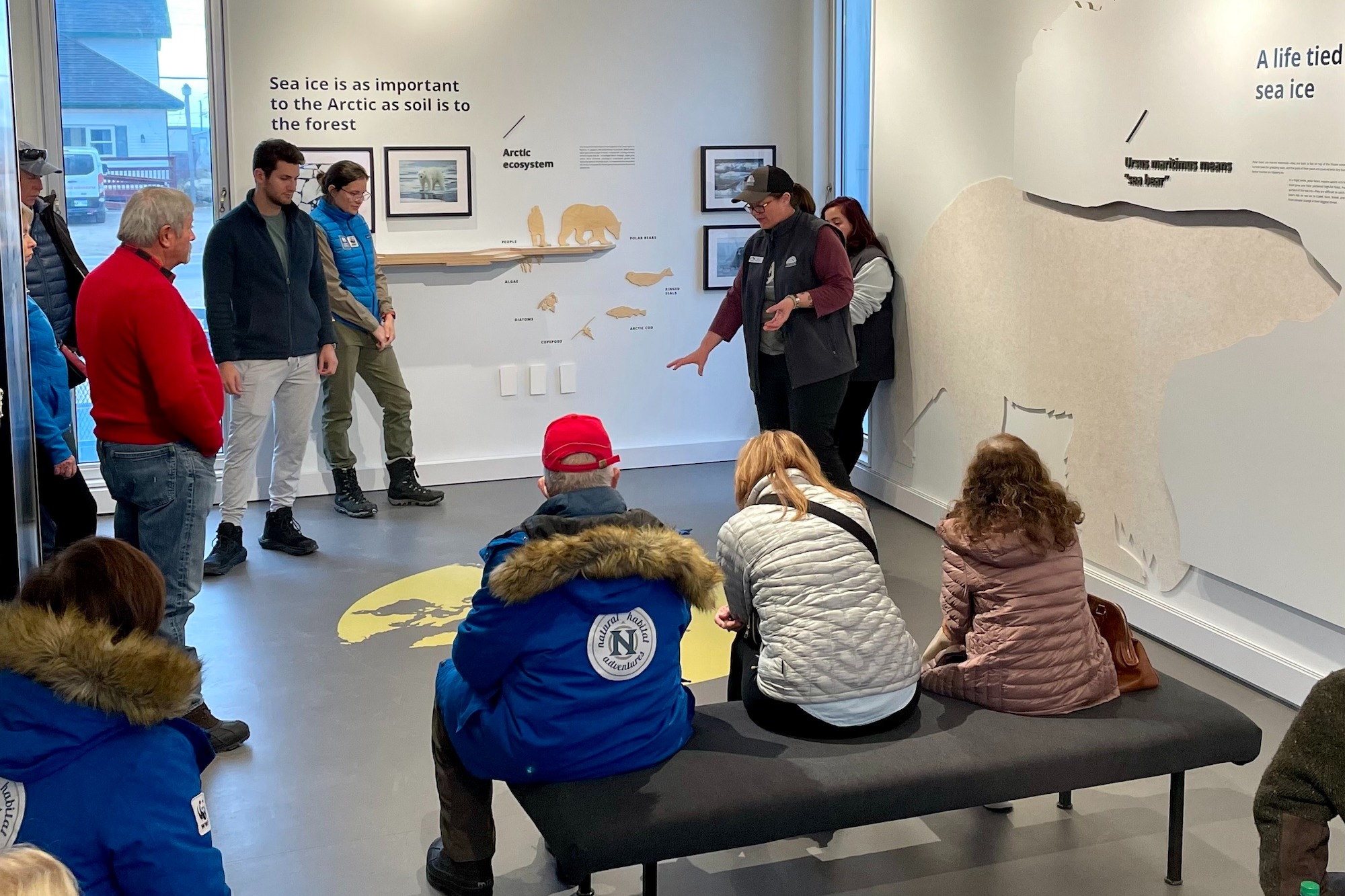 Kayla McCurry giving a field ambassador presentation in the Polar Bears International House