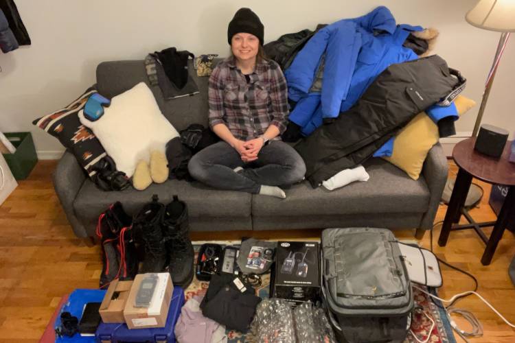 Kt Miller with her clothing packed for Svalbard fieldwork