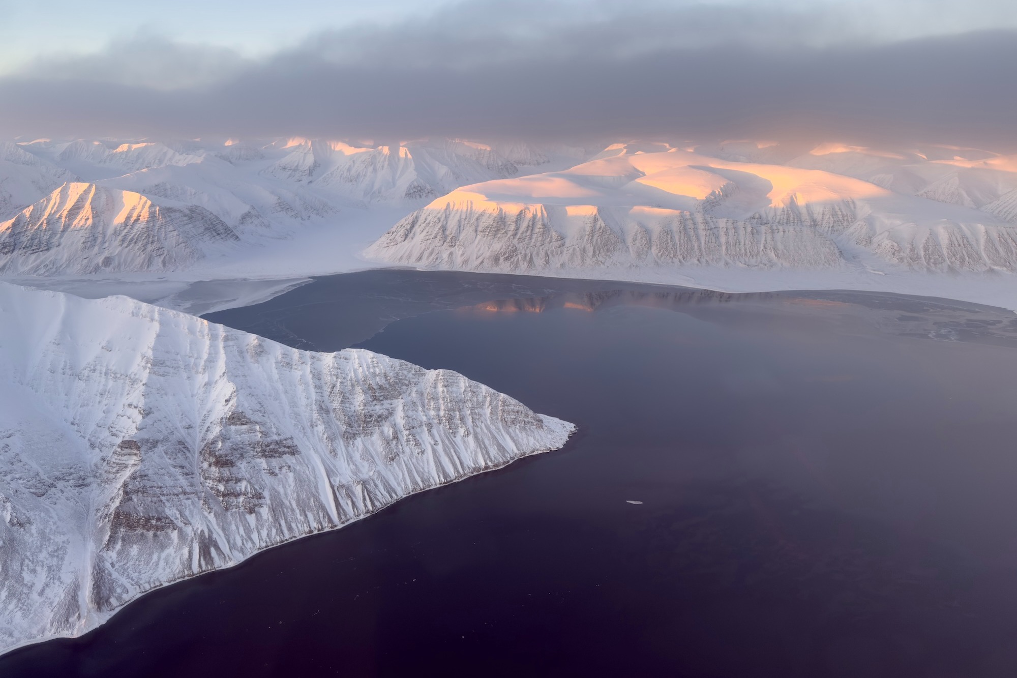 Svalbard mountains and fjord From the helicopter 