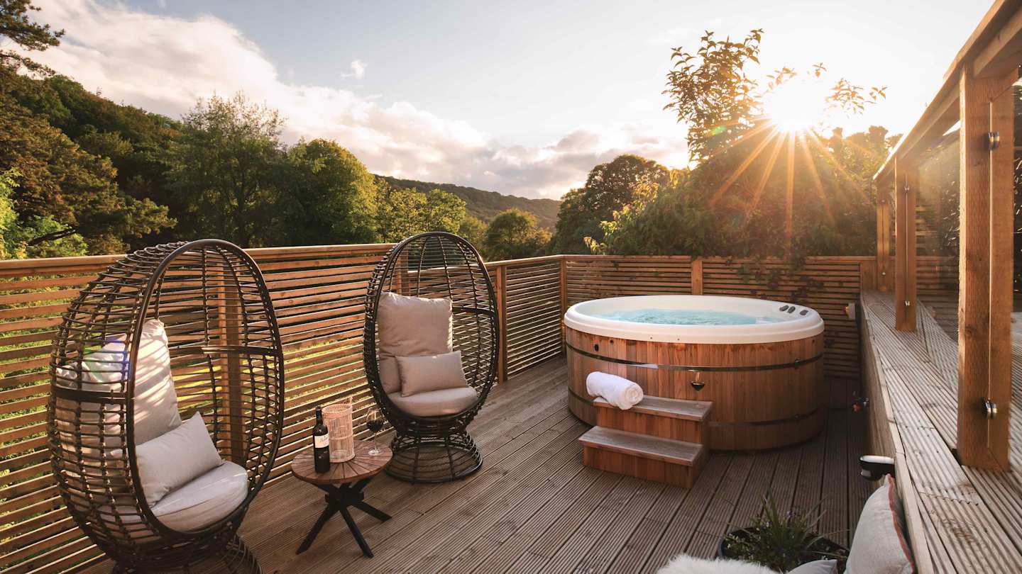 Hot tub and terrace area, The Old Apple Store, Plum Guide home in Devon, UK