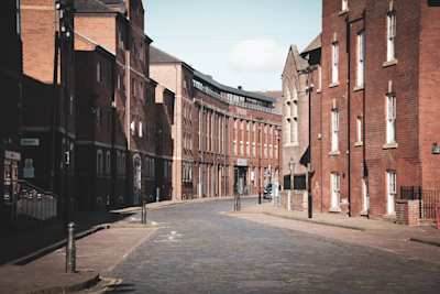 Brown buildings lining a street in Leeds, UK