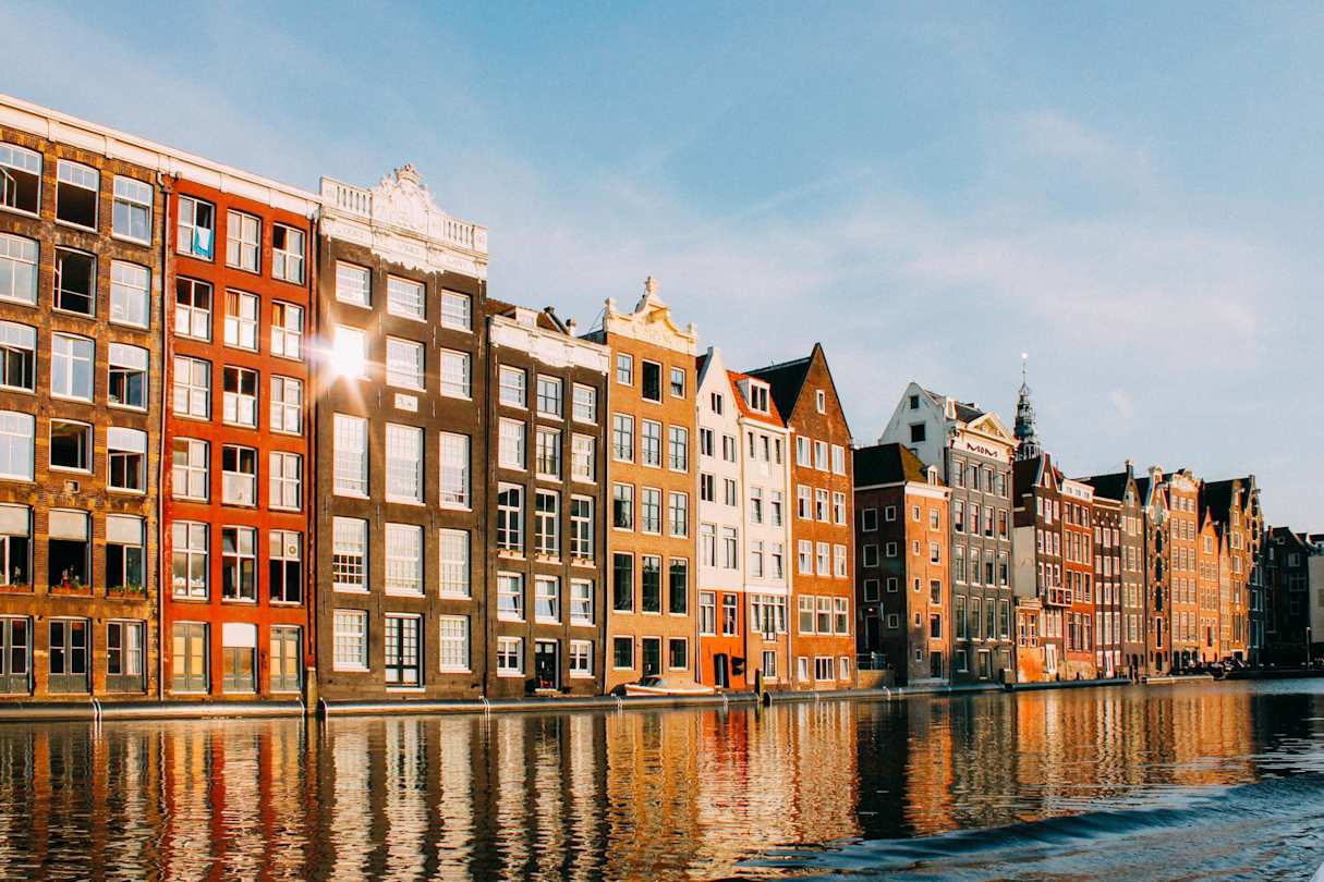 Terraced buildings alongside a canal in Amsterdam, Netherlands