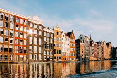 Terraced buildings alongside a canal in Amsterdam, Netherlands