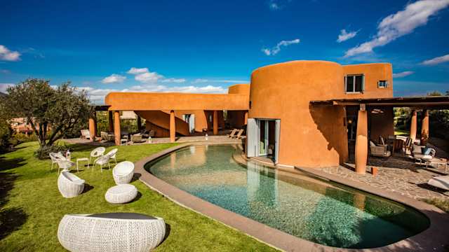 Adobe Sculpture, Plum Guide home in Sardinia, Italy