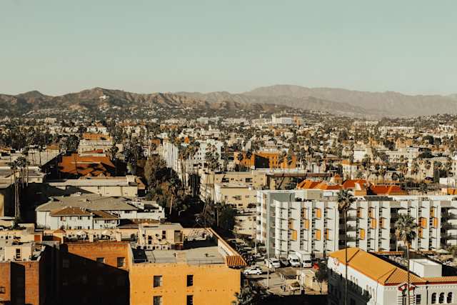 Buildings and mountains in the Los Angeles skyline on a sunny day, California, USA