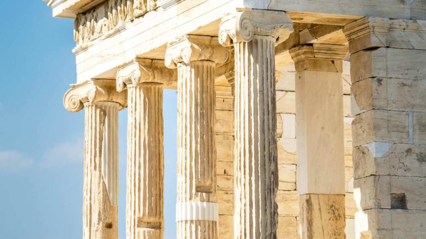 A side-on view of the beams at the front of the Parthenon at the Acropolis on a sunny day, Athens, Greece