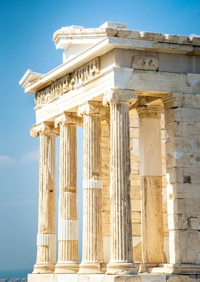 A side-on view of the beams at the front of the Parthenon at the Acropolis on a sunny day, Athens, Greece