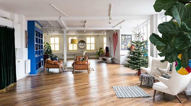 Open plan living room inside the The King of Shoreditch, Plum Guide home