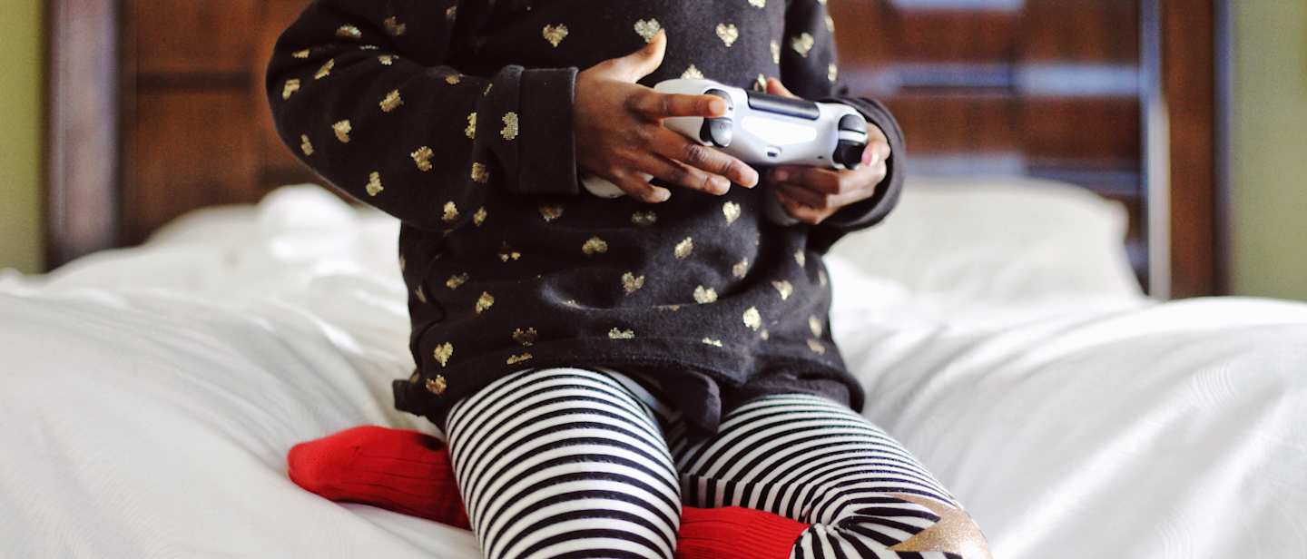 Child playing videogame