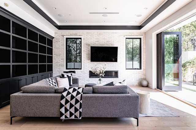 The open living space in Urban Farmhouse embraces the mix of indoor and outdoor living