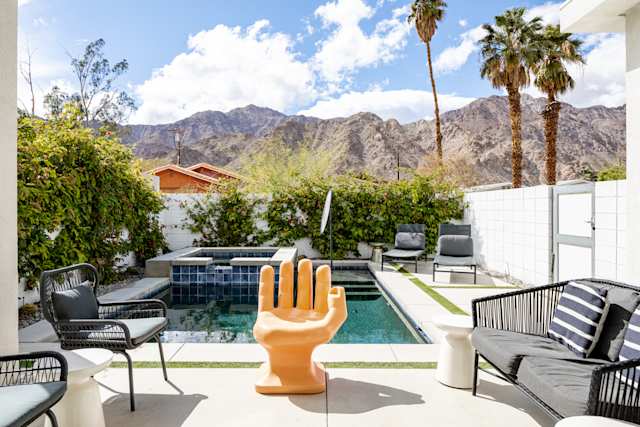 The oasis-like garden and pool area at Salty Oasis