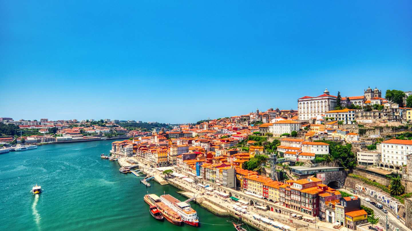 Cityscape over the Douro River and the colourful waterfront during a sunny day, Porto