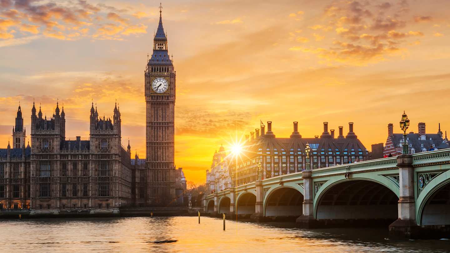 A view of Big Ben and Westminster Bridge over the River Thames at sunset, London, England, UK