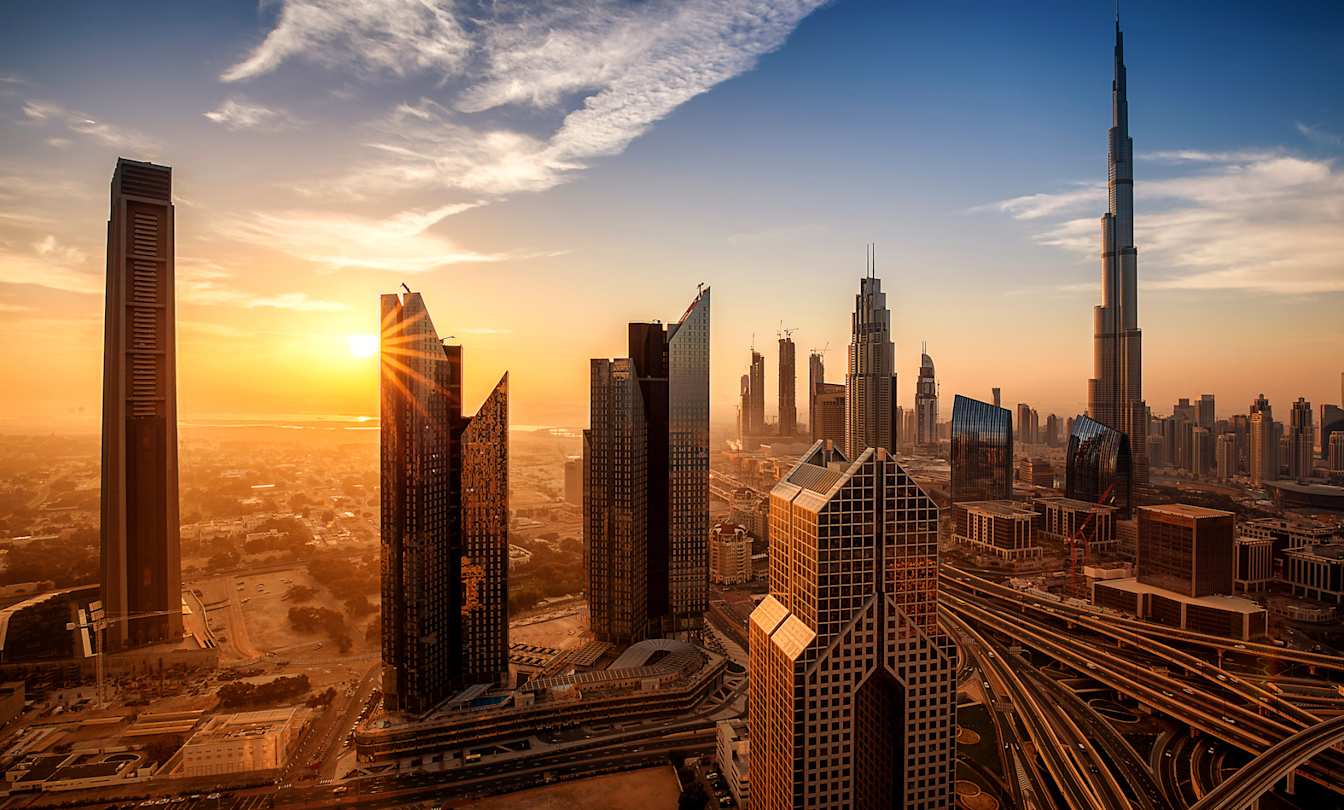 An aerial view of skyscrapers in downtown Dubai at sunrise, Dubai, UAE