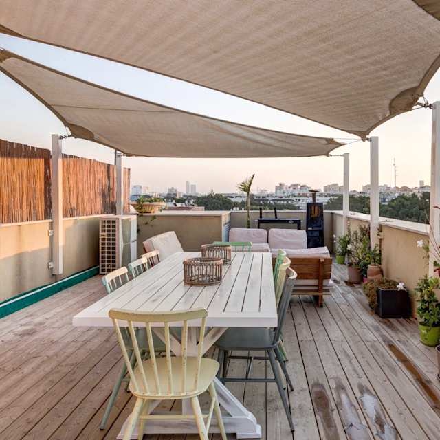 Large terrace of Plum Guide home, Late Night Dinner at sunset