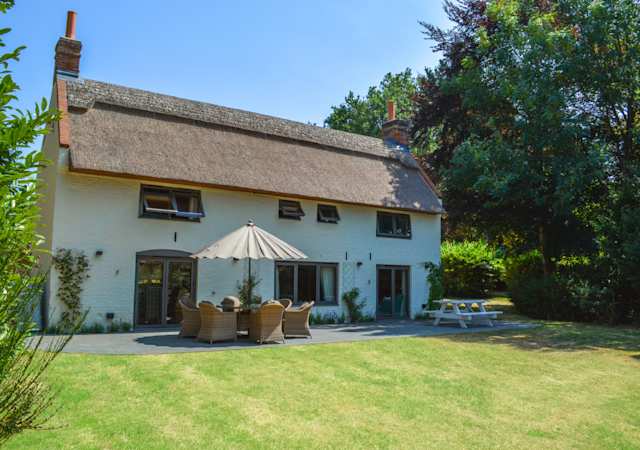 Woodland Grey, Plum Guide home in Norfolk, UK