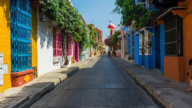 Colourful buildings along a narrow street on a warm day in Cartagena, Colombia
