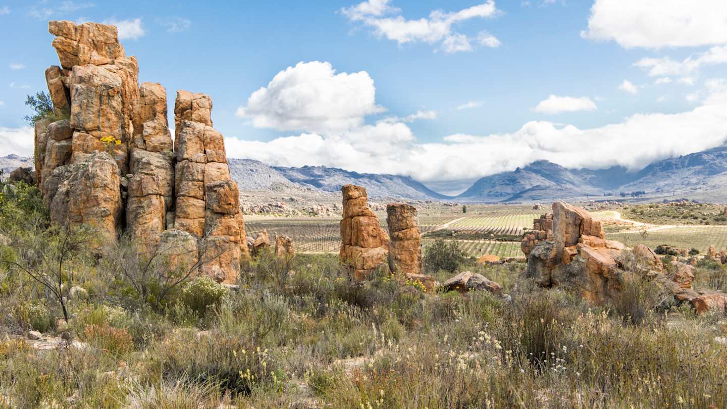 Landscape of interesting rock formations in the Cederberg mountains with cloudy blue sky, Cape Town