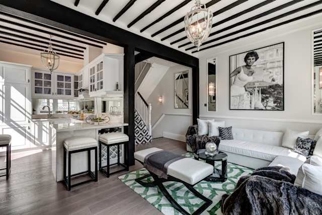 Monochrome living and kitchen area of Plum Guide home, Chic Victoria