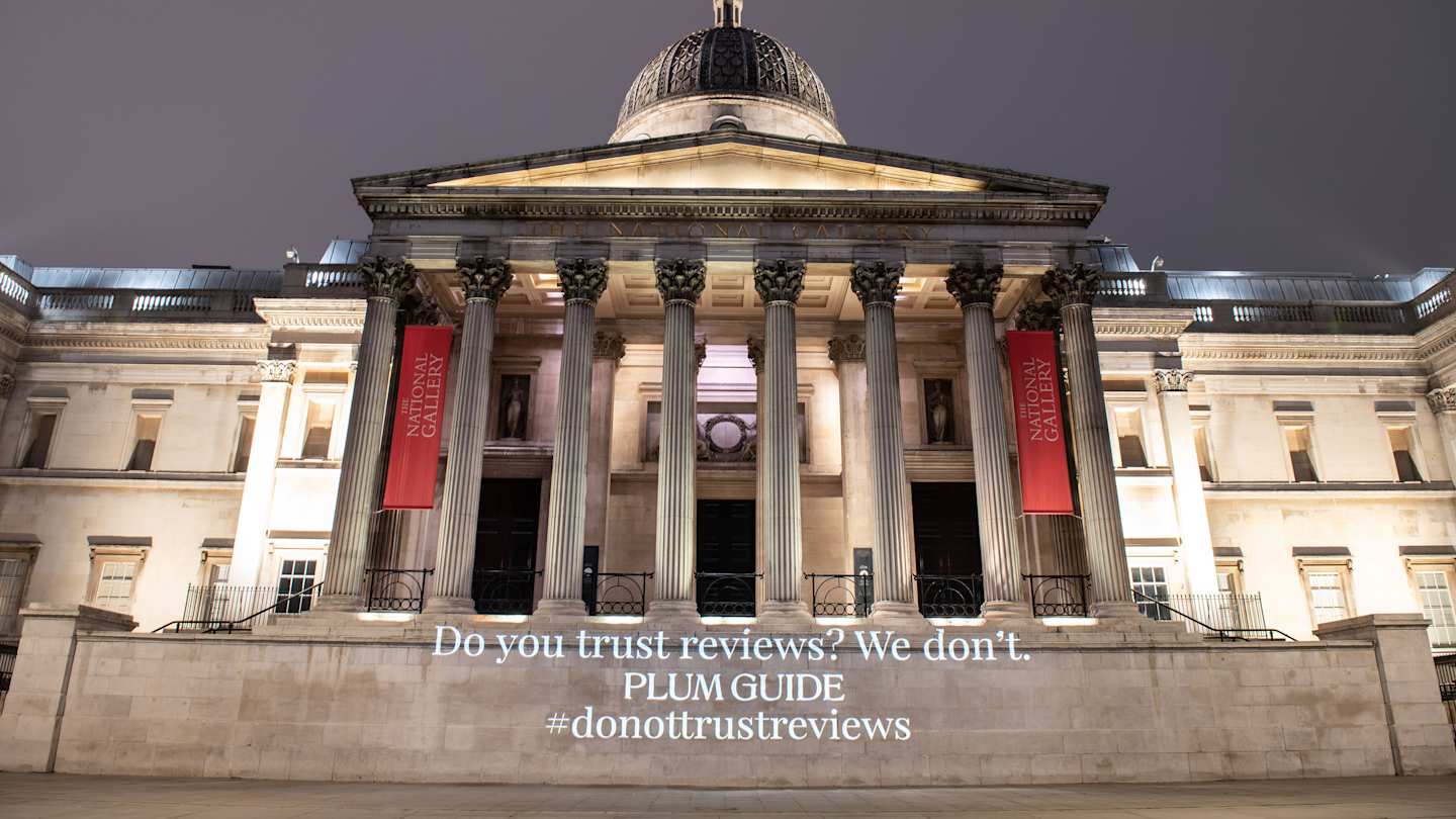 Absurd 1-star review projected onto The National Gallery, London