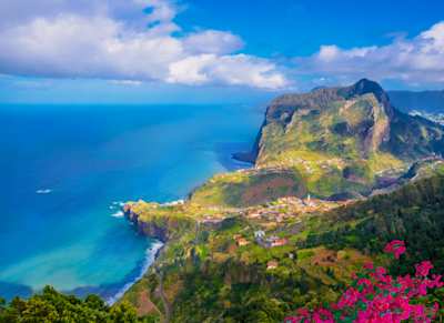 Aerial view over Faial city fort and Santana region on the ocean coast of Madeira island, Portugal