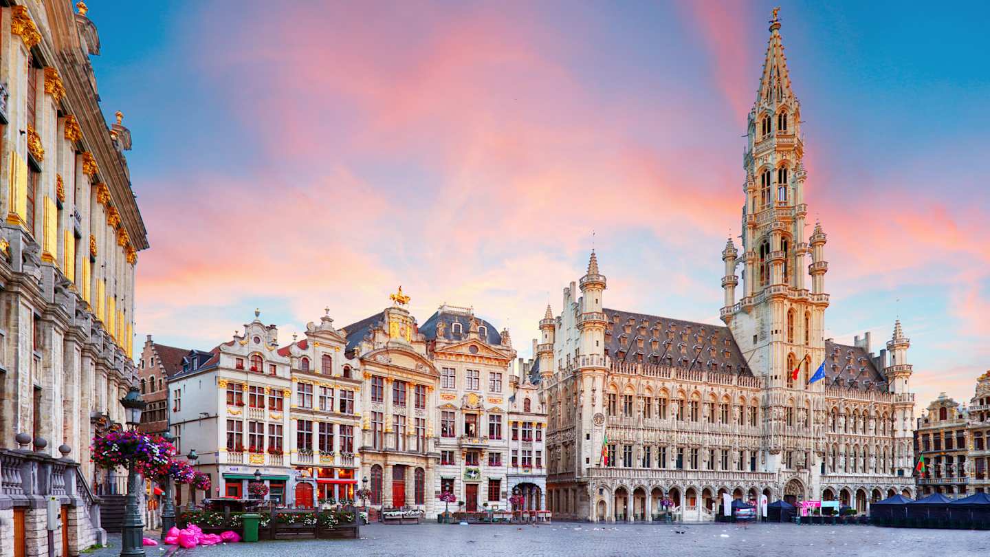 Pink sunset behind the architecture in Grand Place, Brussels, Belgium