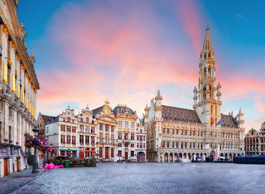 Pink sunset behind the architecture in Grand Place, Brussels, Belgium