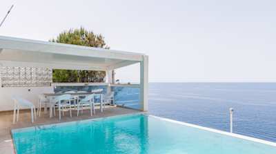 The panoramic terrace with a pool at Sea View Siesta, a Plum Guide home in Mallorca