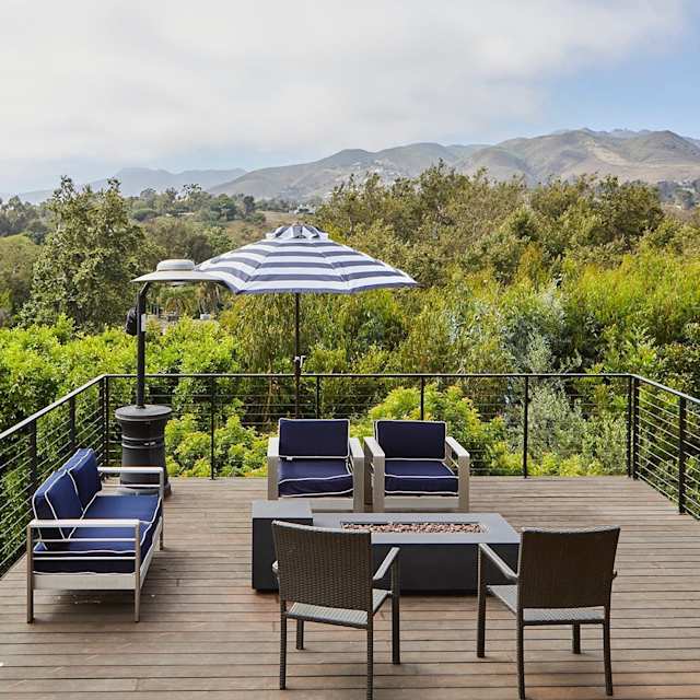 The outdoor terrace of Plum Guide home, Cue Ball overlooking the Malibu hills