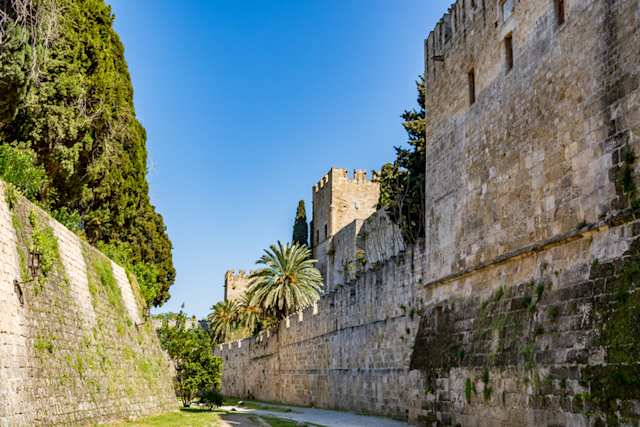 The walls and trees outside the Palace of the Grand Master of the Knights of Rhodes, Greece