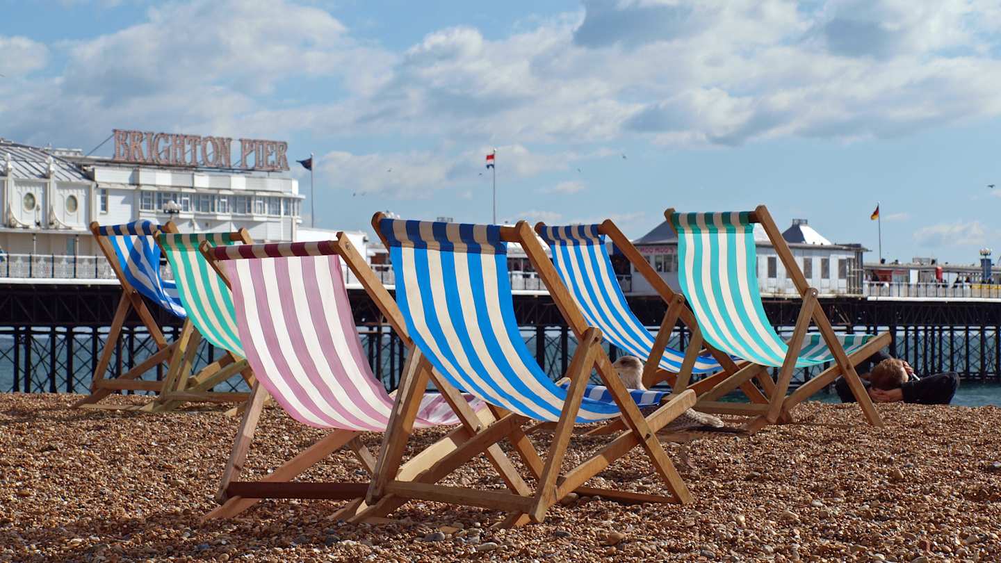 Sun loungers at Brighton Beach, England, UK
