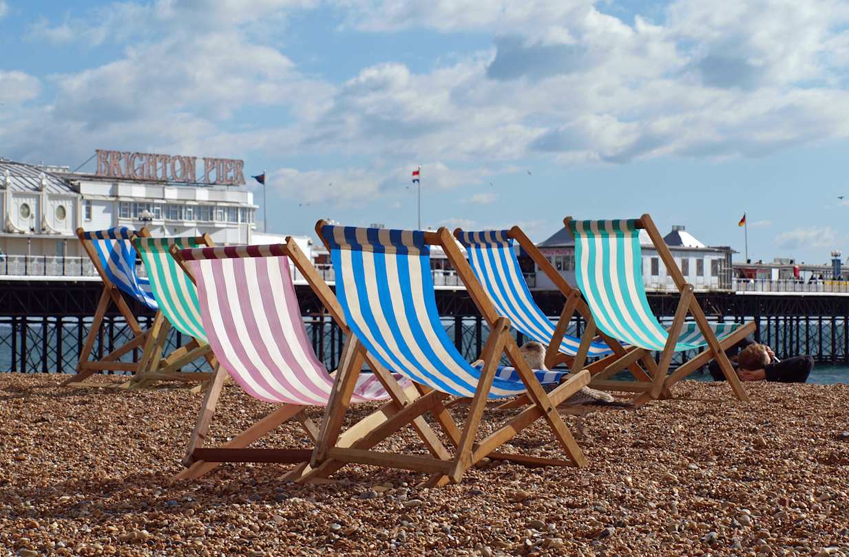 Sun loungers at Brighton Beach, England, UK
