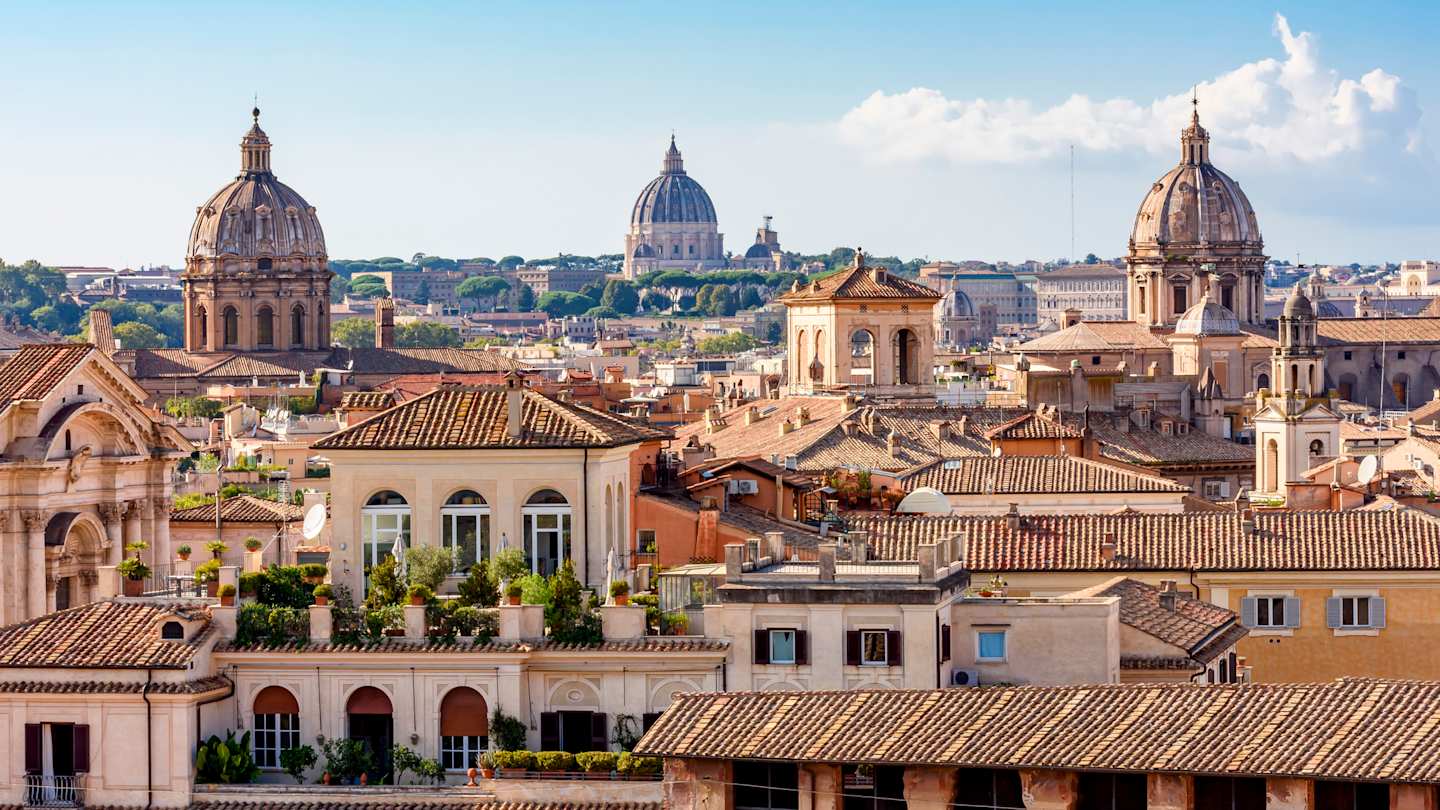 Cityscape with the dome of St. Peter's Basilica, the Vatican and rooftops, Rome