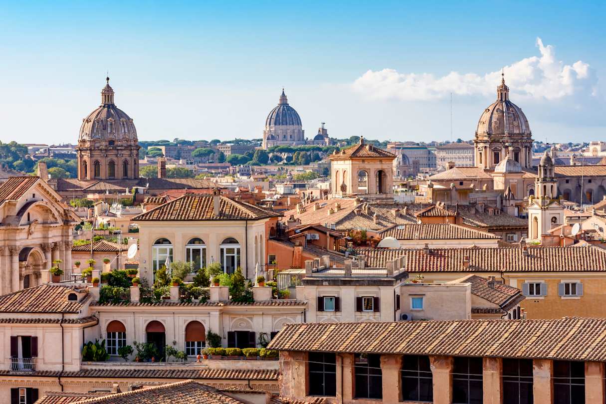 Cityscape with the dome of St. Peter's Basilica, the Vatican and rooftops, Rome