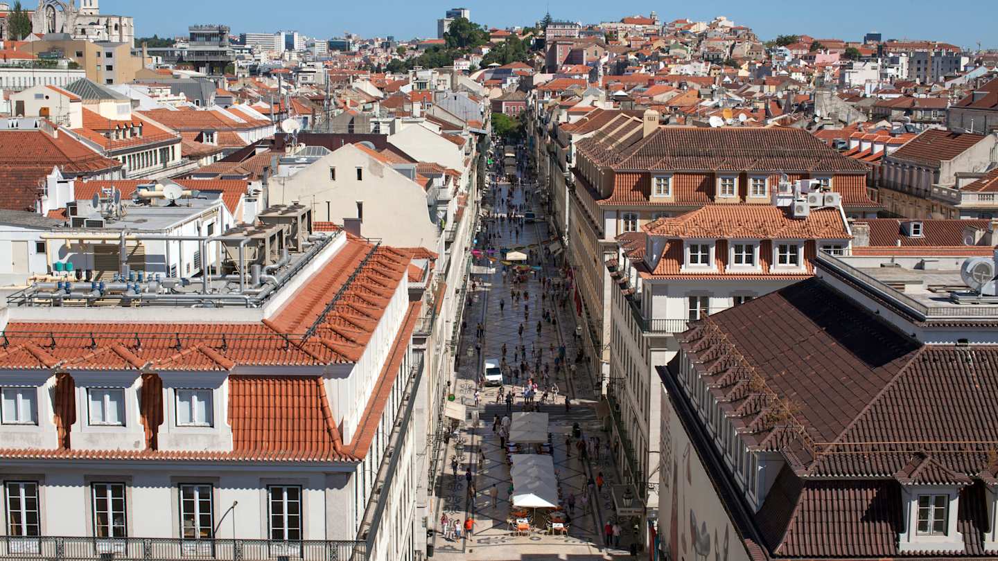 Tram moving through Lisbon streets