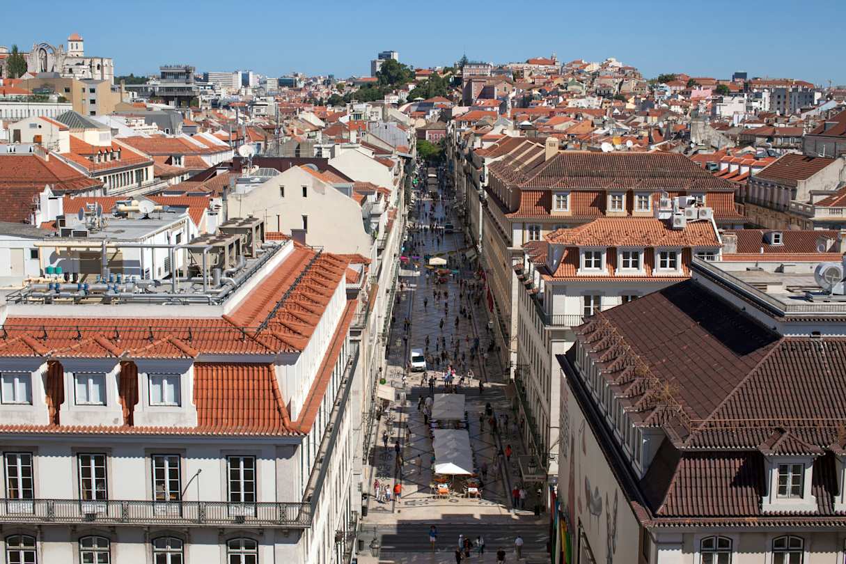 Tram moving through Lisbon streets