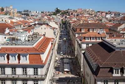 Tram moving through Lisbon streets