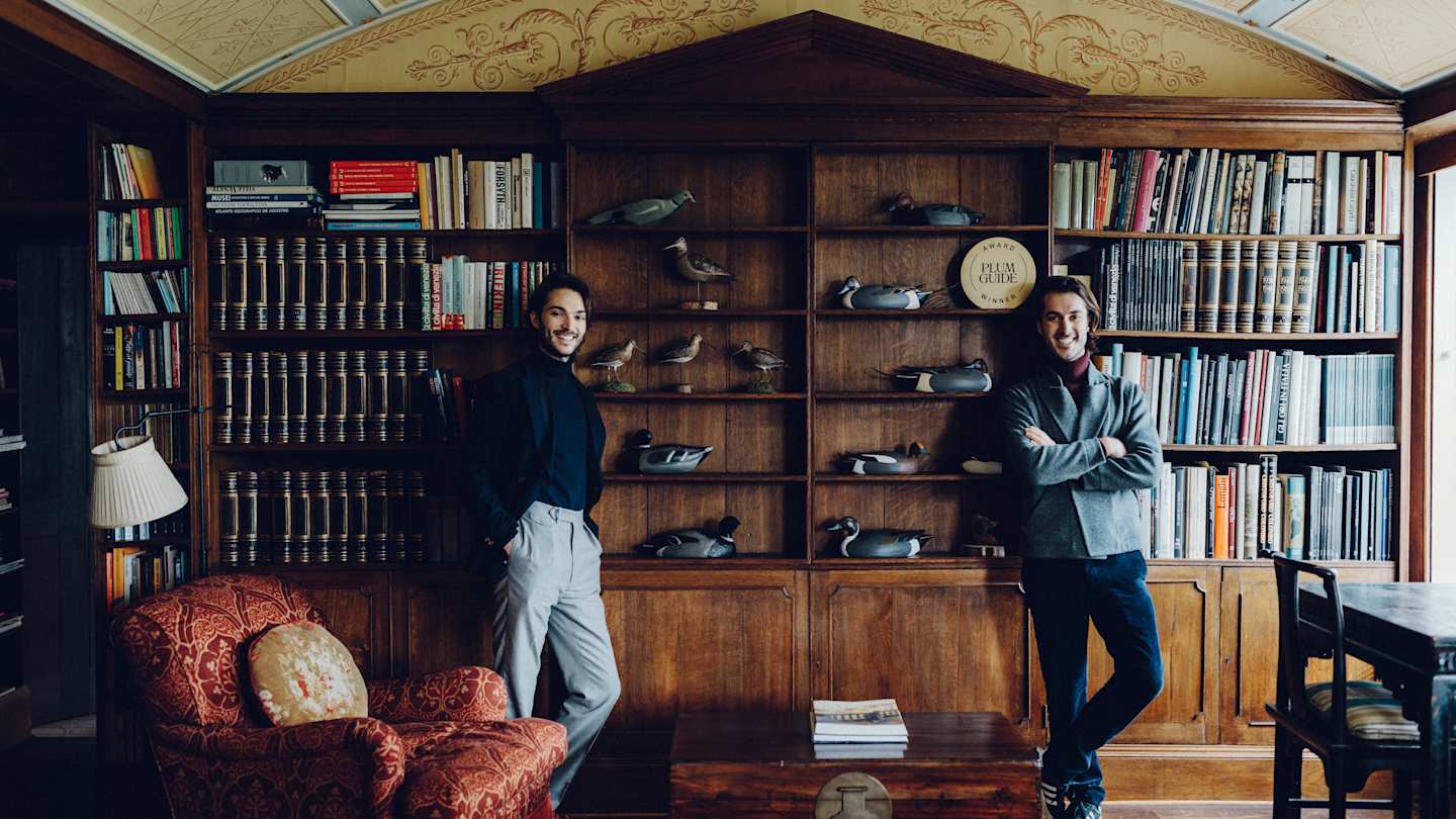 Hosts Tommaso and Italo in their Plum Guide home, 'Sense & Sensibility'