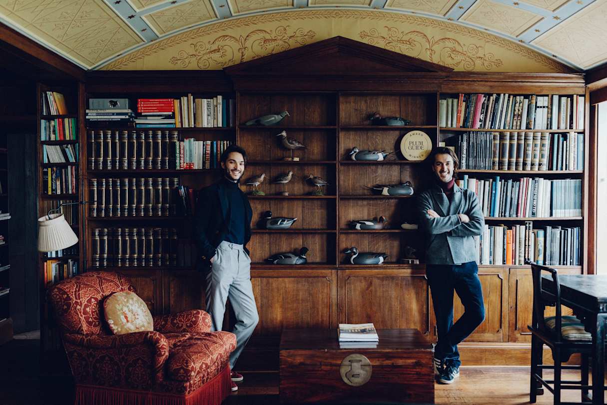 Hosts Tommaso and Italo in their Plum Guide home, 'Sense & Sensibility'