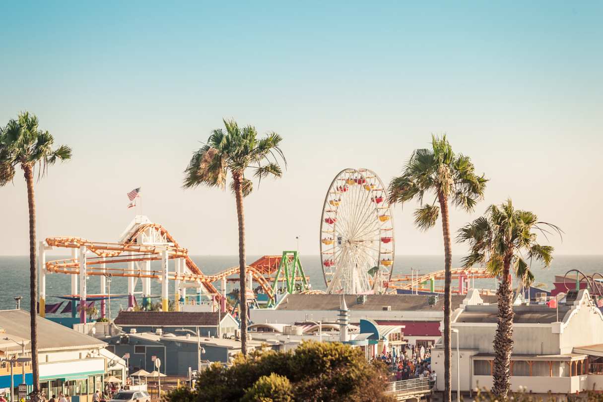 Amusement park with Ferris wheel on Santa Monica Pier, Los Angeles
