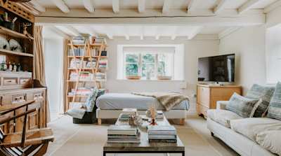 Coffee table books in The Little House, Plum Guide home in the Cotswolds