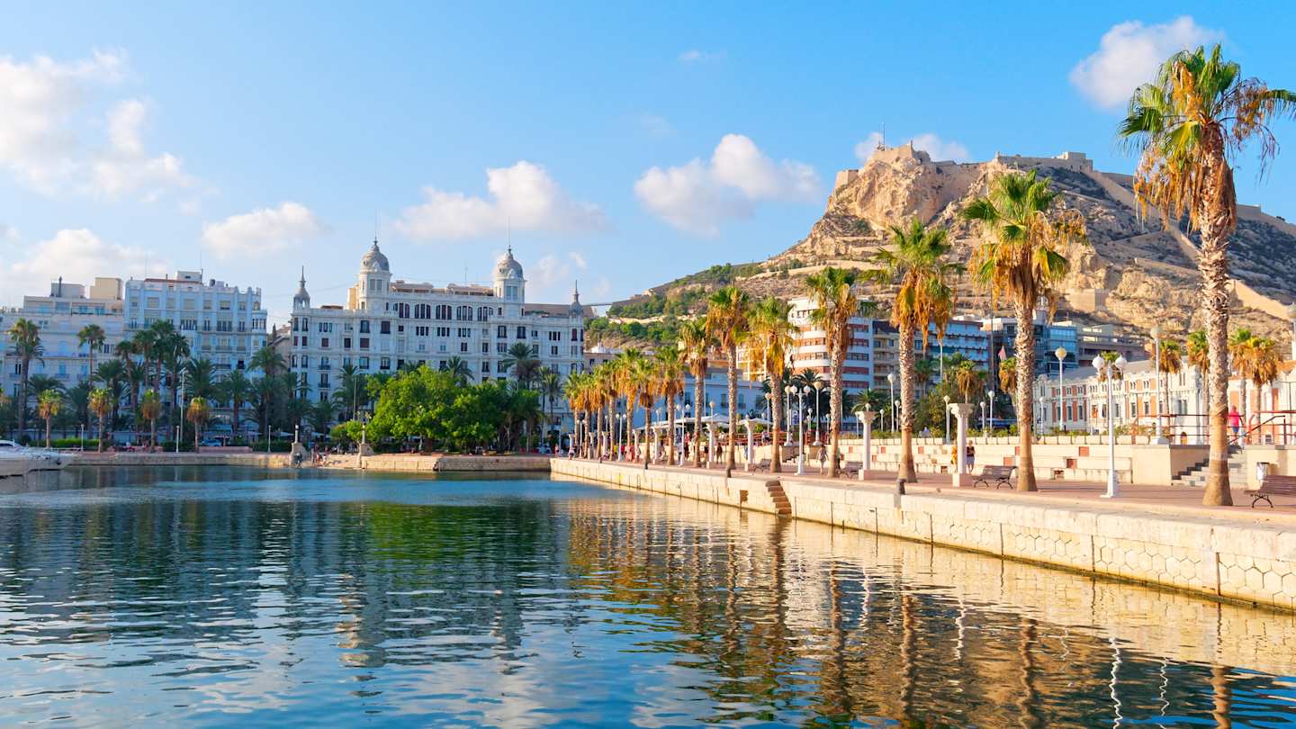Beautiful waterfront promenade with palm trees in Alicante, Spain