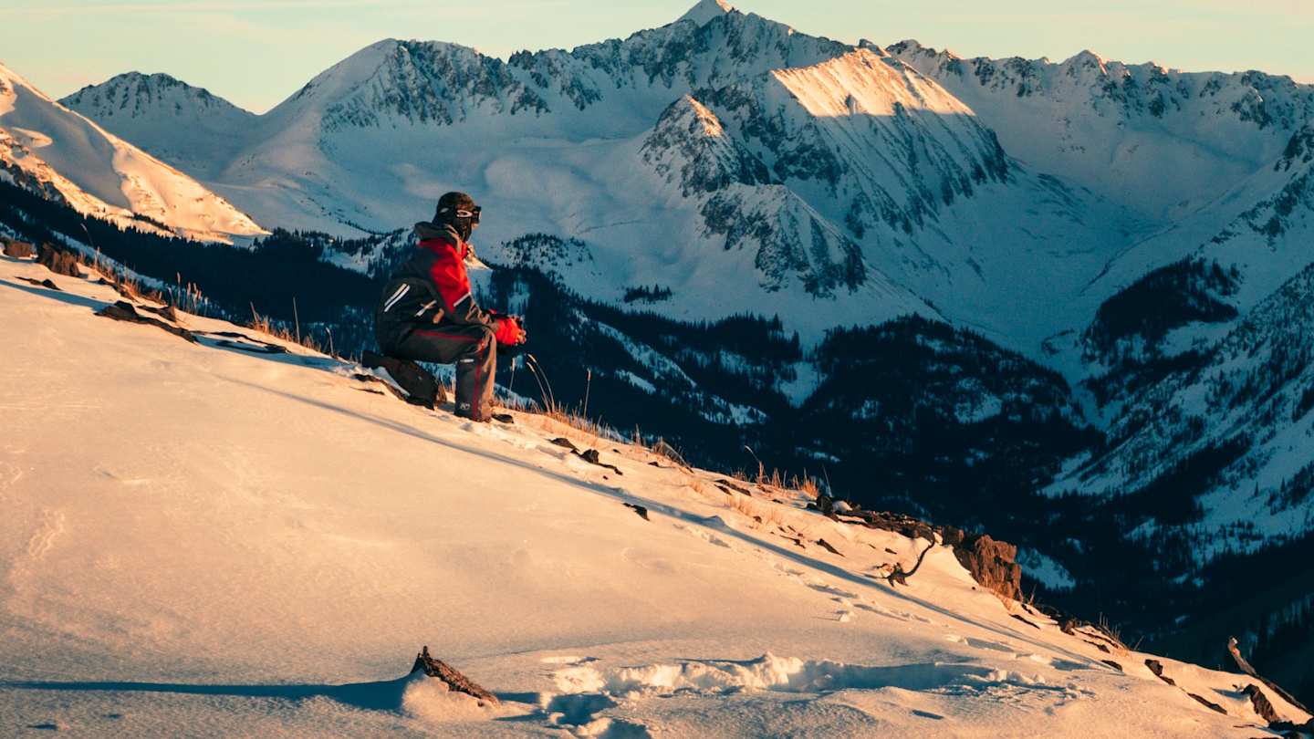 People skiing down a mountain in Aspen, Colorado