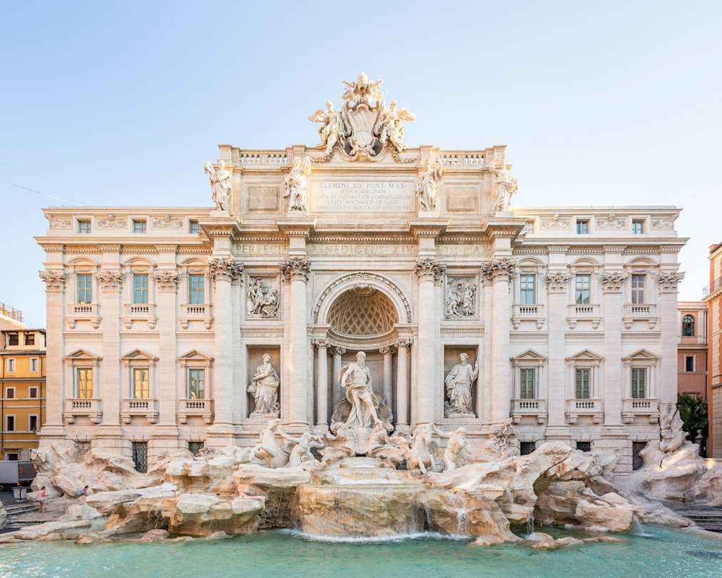 Trevi Fountain in the early hours of a sunny summer's day, Rome, Italy